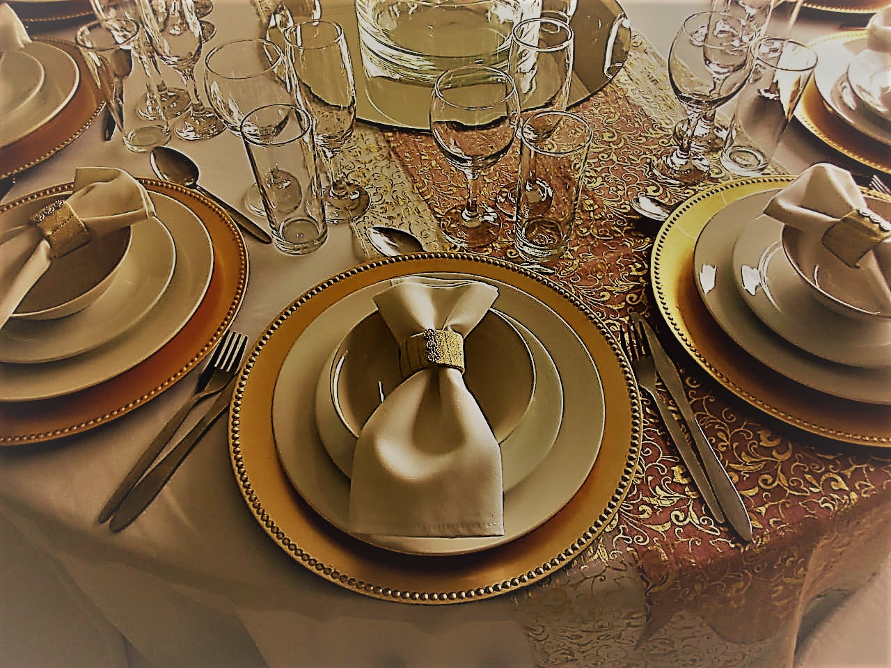 Gold base plates R9, Napkins R6, Napkin Rings R4.50, Table cloths R55, Runners Organza R15, Gold printed Runner R25